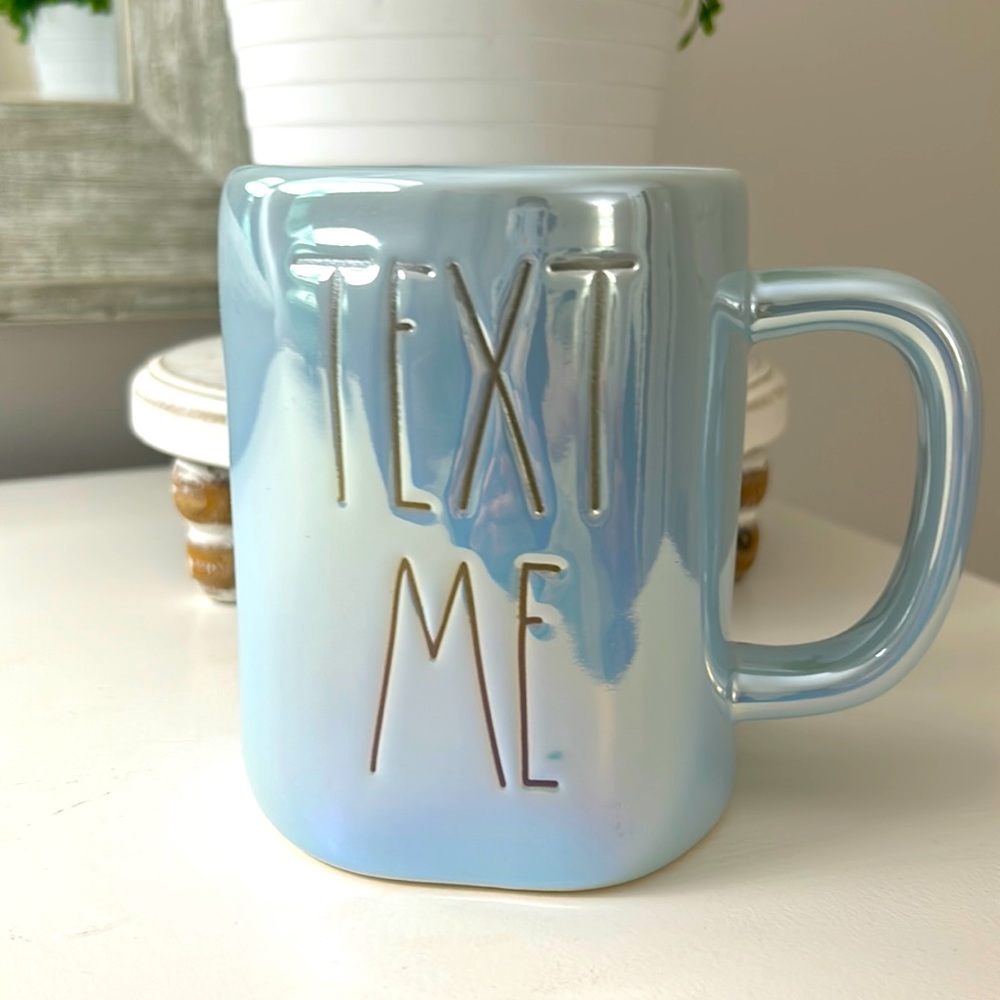 Rae Dunn blue iridescent mug.